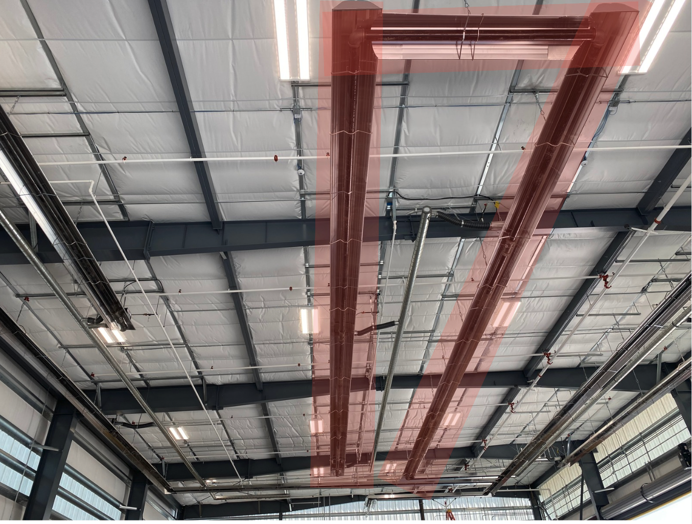 CoRayVAc low intensity infrared heater in the ceiling at a CNG/RNG fleet facility